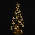 Gold crystal Christmas tree LED light with battery-powered warm glow on a shelf