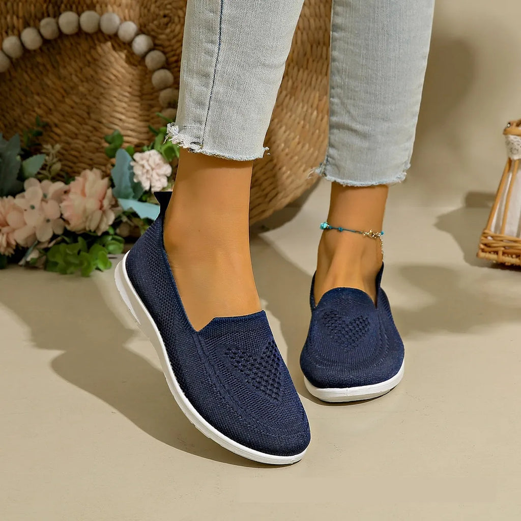 Women's low-top cloth casual shoes with heart pattern detail and mesh lining in multiple colour options