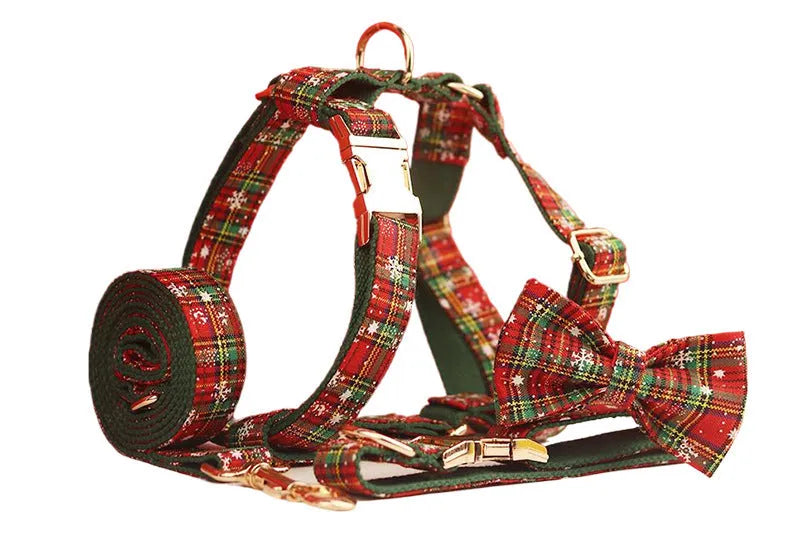 Green background snowflake Christmas pet collar set with matching dog vest and leash