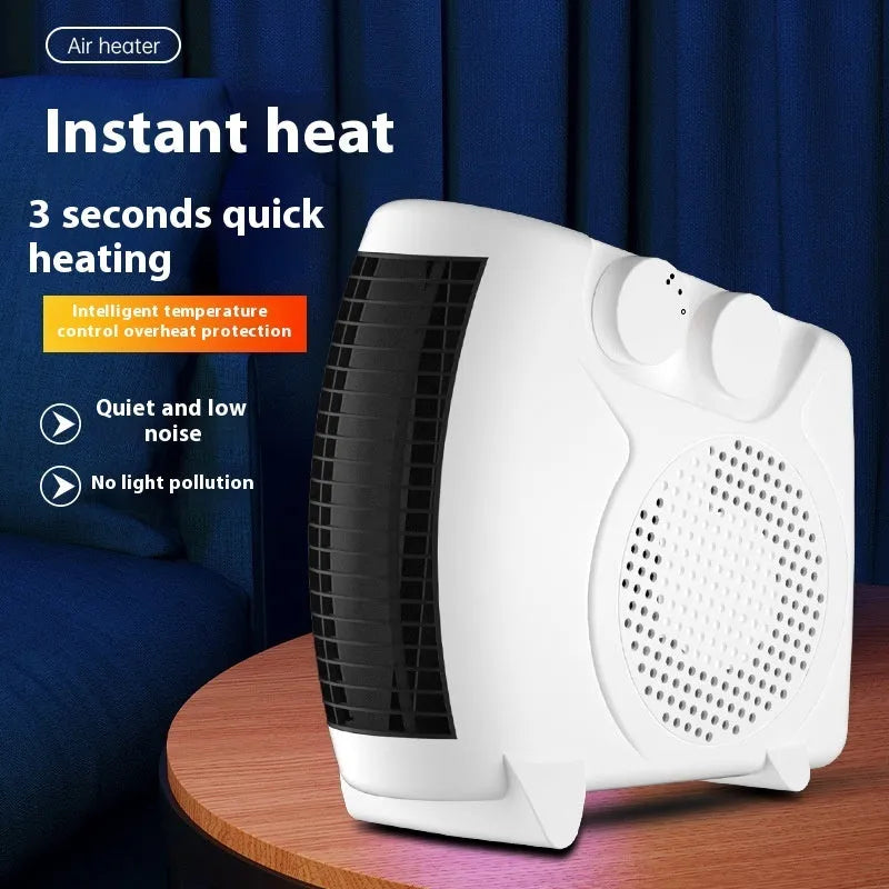 Small white electric space heater on a wooden desktop.