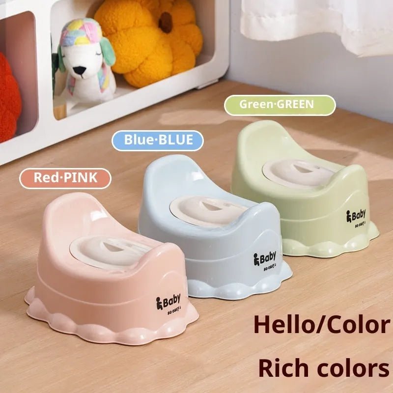 Children's portable thickened toilet in green, pink, and blue with lid option on a white background