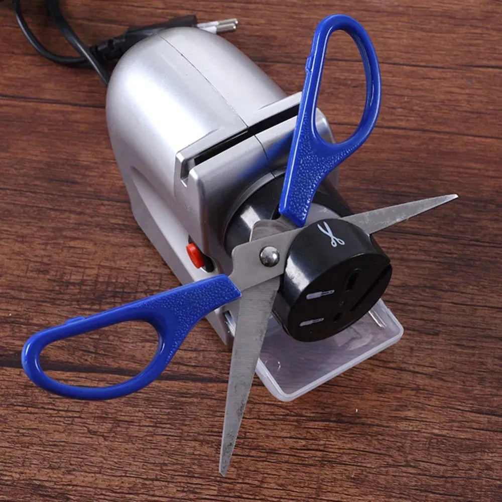 Silver electric knife sharpener with ABS body and gold accents, size 19 x 16.6 x 6.3cm