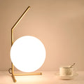 Creative modern floor lamp with glass shade in a living room setting