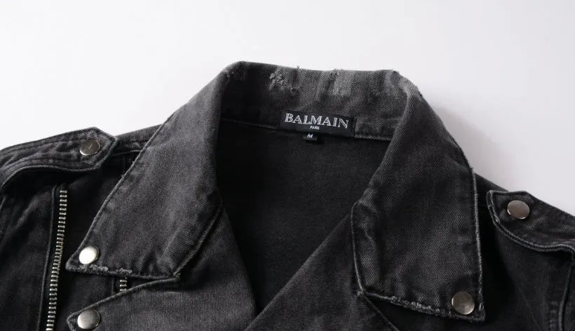 Black denim jacket with lapel collar, zip placket, long sleeves and zipper pockets, slim fit