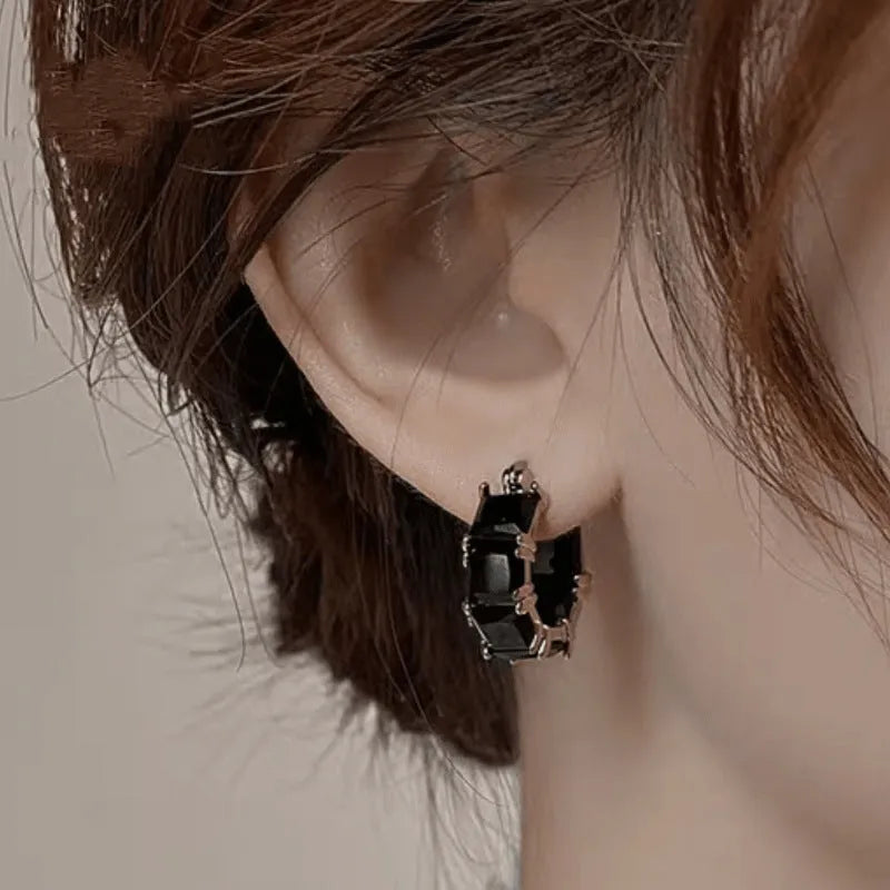 Fashionable geometric U-shaped ear rings with zircon stones and gold settings