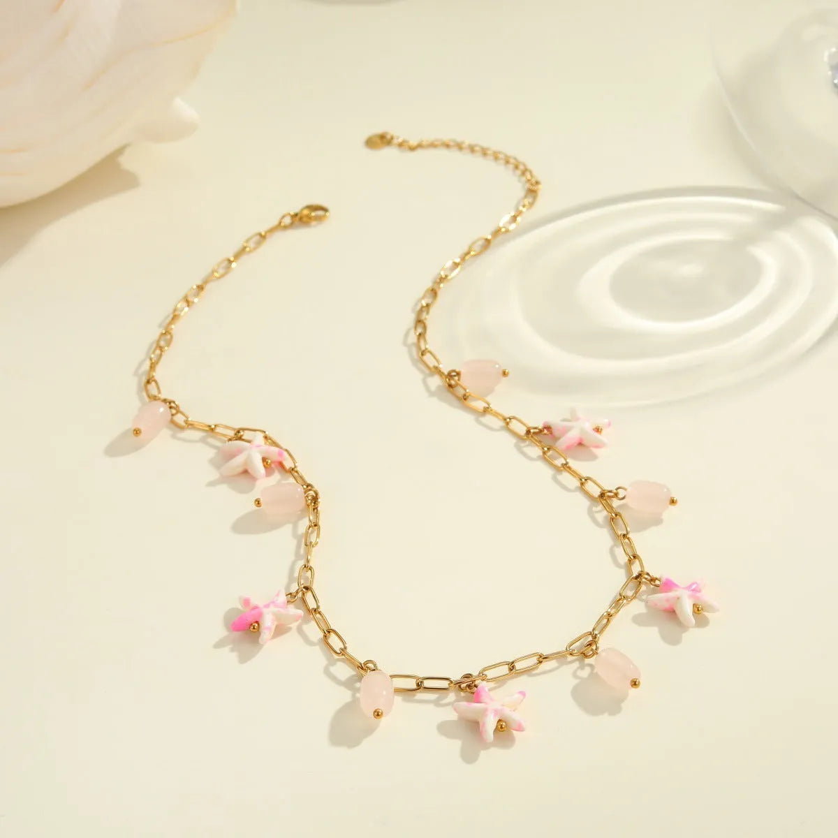Stainless steel starfish necklace and bracelet set with electroplated 18K finish in blue, green, or pink