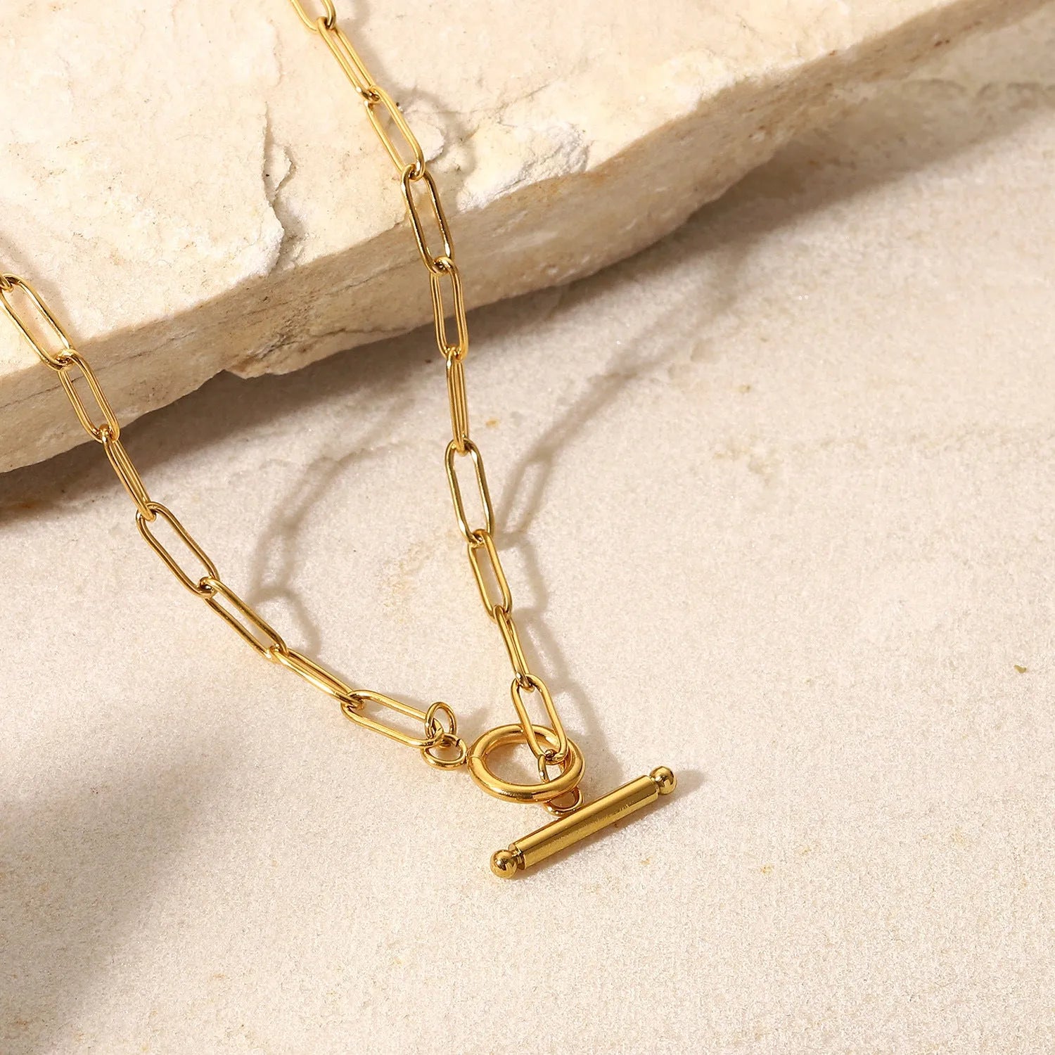 Stainless steel geometric necklace with electroplated finish in gold and silver colour options