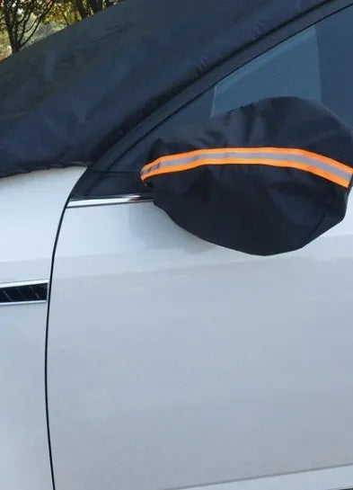 Magnetic car snow shield in black or silver, shown covering a car windscreen, available in 215x150x125cm and 245x180x145cm.