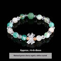 Women's natural gemstone charm bracelet with cat head design and copper detailing