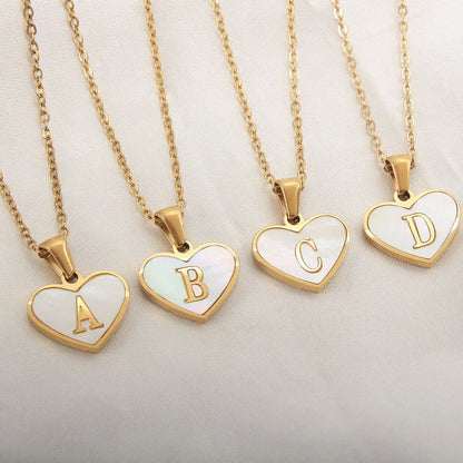 A personalized heart-shaped necklace with a 26-letter charm, crafted from high-quality stainless steel and gold plating.