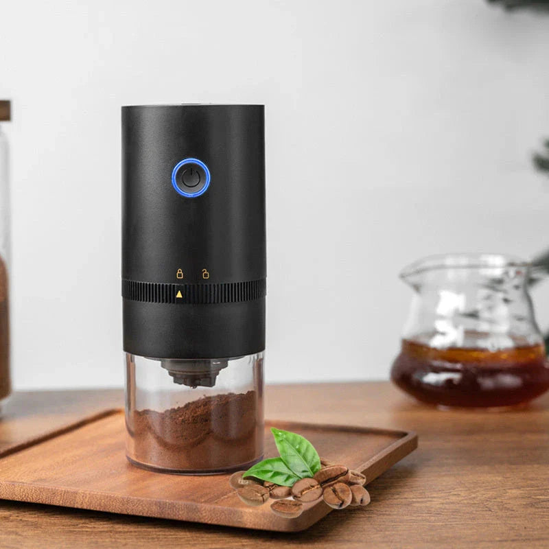 Portable USB-C powered electric coffee grinder with adjustable ceramic burr mechanism for freshly ground coffee