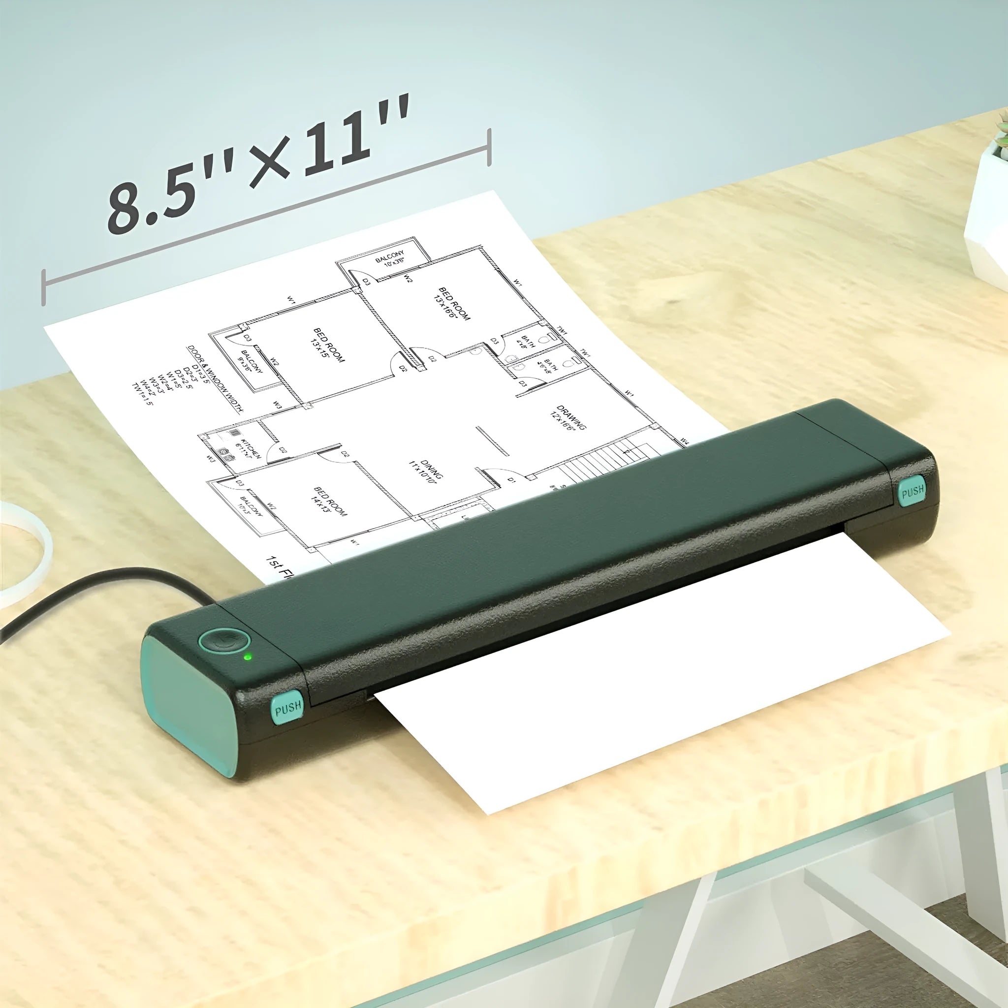 Phomemo M08F portable A4 thermal printer in silver black colour on a desk