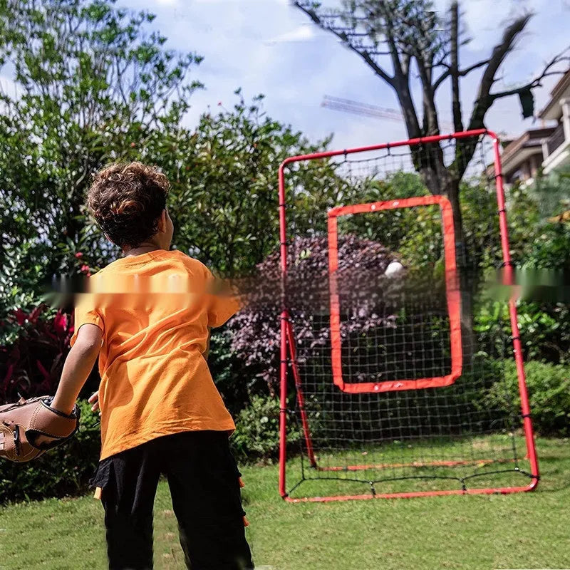 Red metal-frame portable baseball training net set up in a garden, measuring 4 feet wide by 6 feet high.