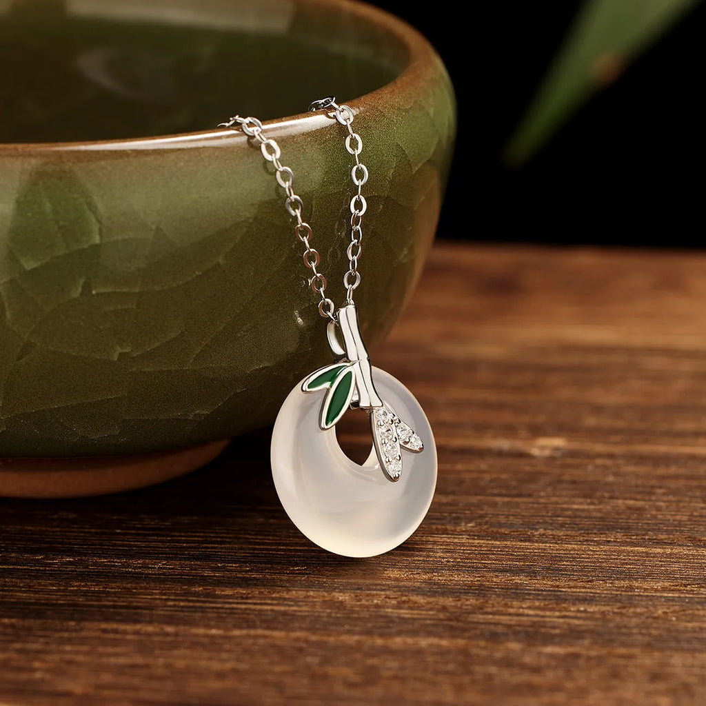 Natural chalcedony peace buckle pendant necklace in 925 silver with leaf shape and bamboo joint design, white gold finish