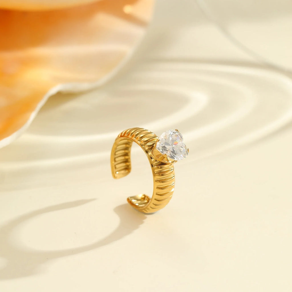 Gold electroplated geometric zircon ring with open mouth design on stainless steel