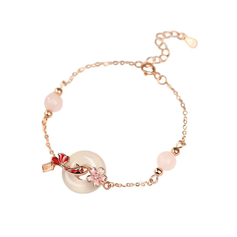 S925 sterling silver bracelet with white chalcedony crystal flower and koi charm
