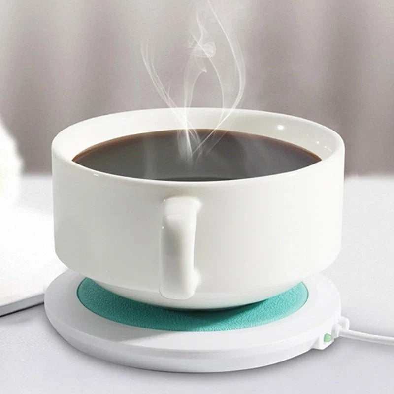 Stylish USB-powered mug warmer with a sleek, modern design that keeps your coffee, tea, or hot chocolate at the perfect temperature all day.