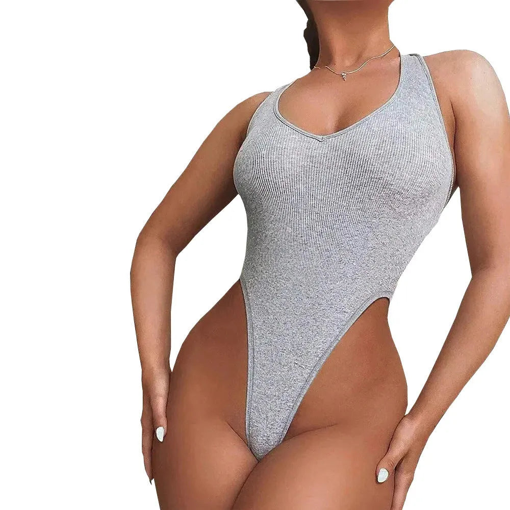 Grey women's halter neck jumpsuit with high-waist shorts made from viscose fabric.