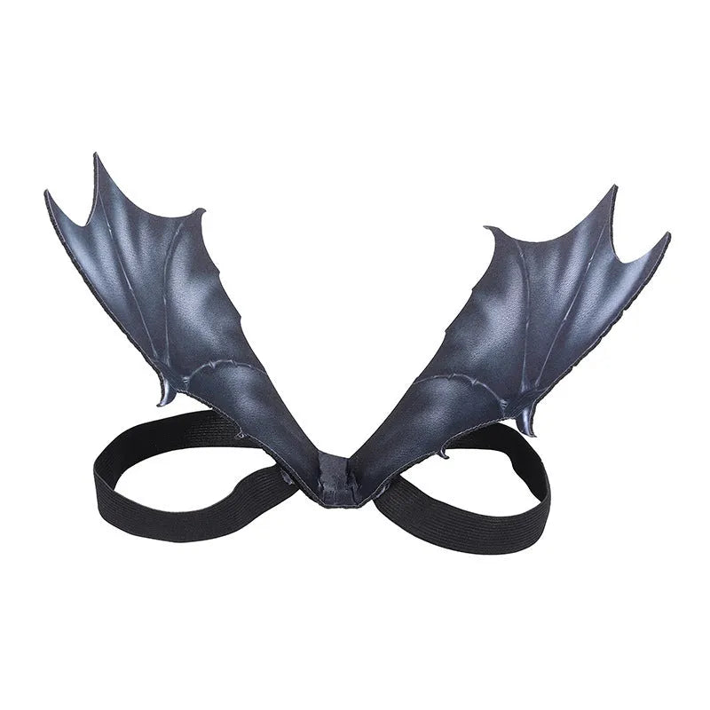 Black cloth bat wing costume for pets on a dog, showing three size options for Halloween.