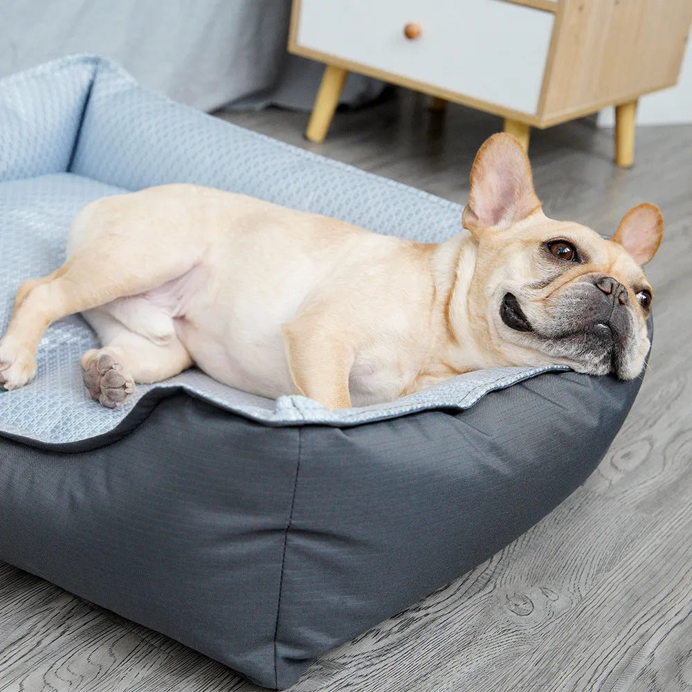 Soft grey dog bed with cat cave design and removable cover shown in small, medium, and large sizes.