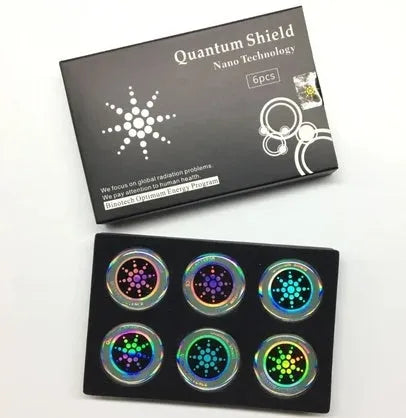 Six mobile phone anti-radiation stickers in gold and silver colours for electromagnetic protection