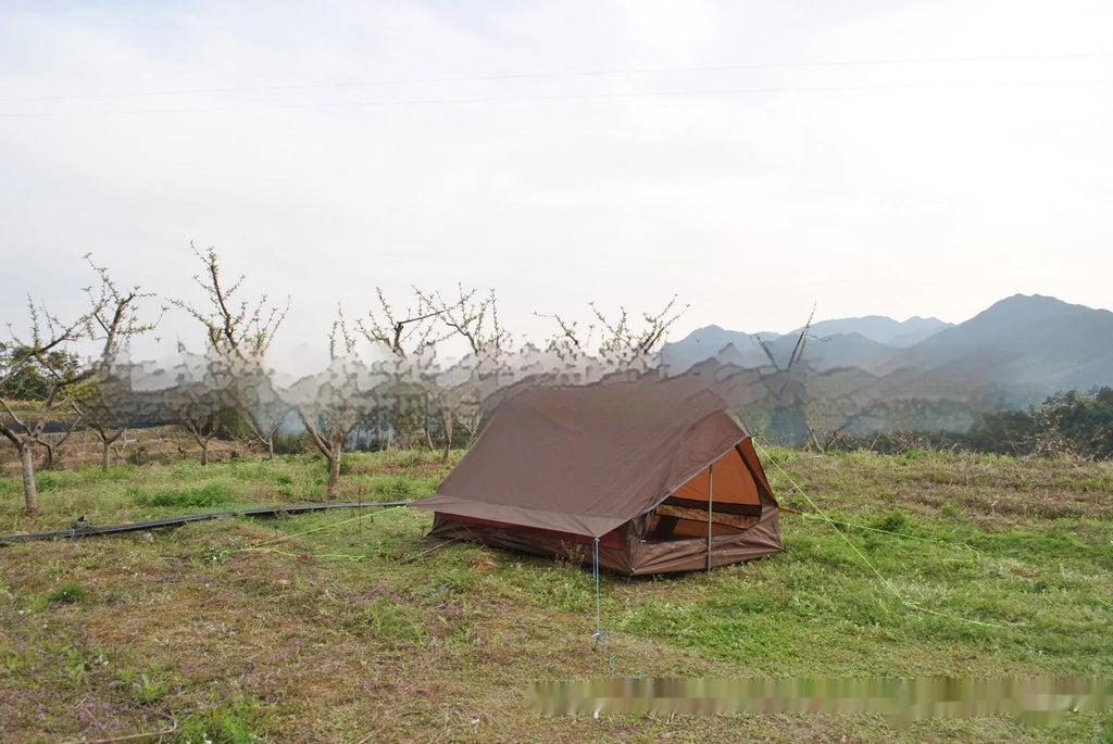 Brown or white A-line pole-free cabin tent for 2-3 people with hiking cane setup.
