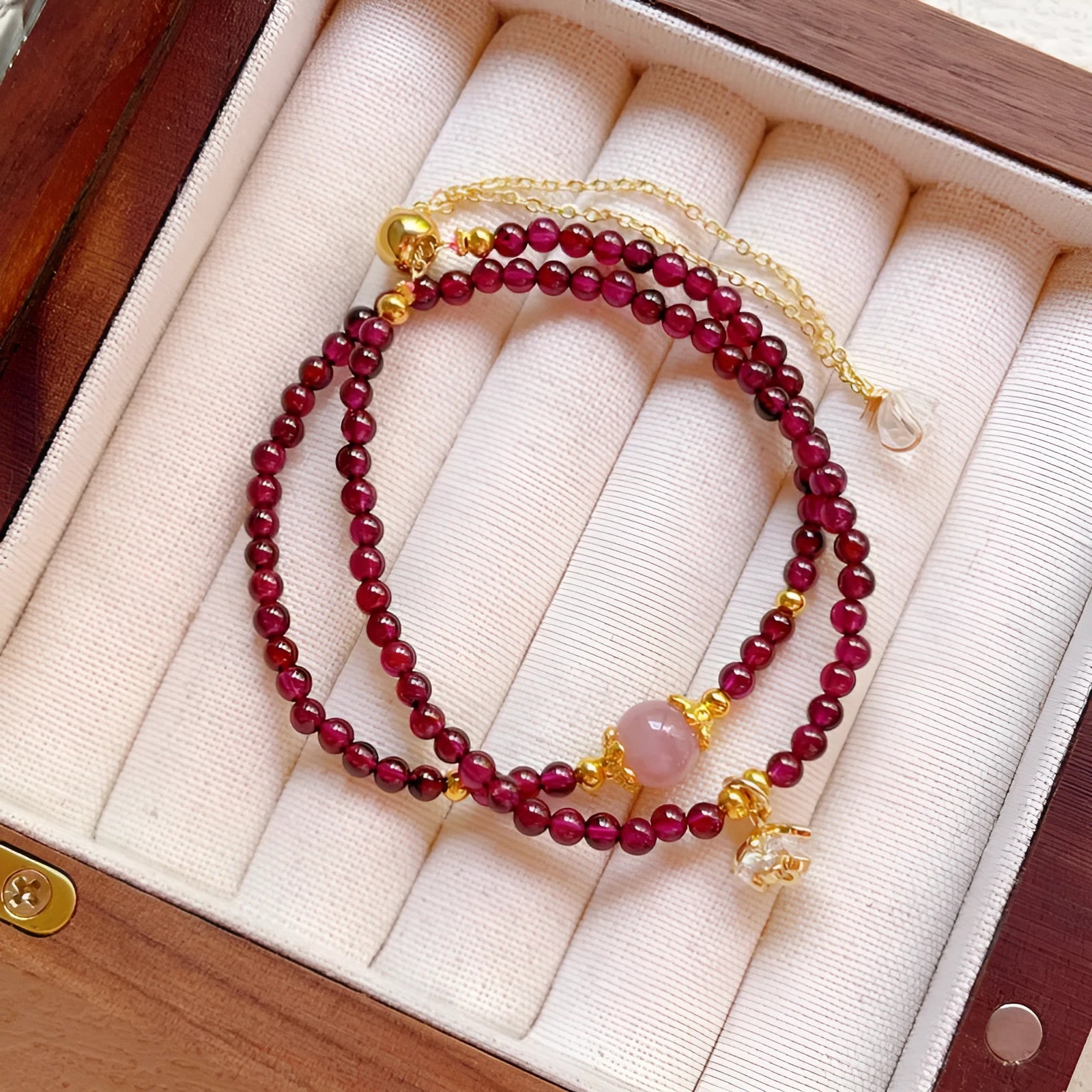 Women's natural garnet bracelet with double ring design in H311 colour, handcrafted using manual processing techniques