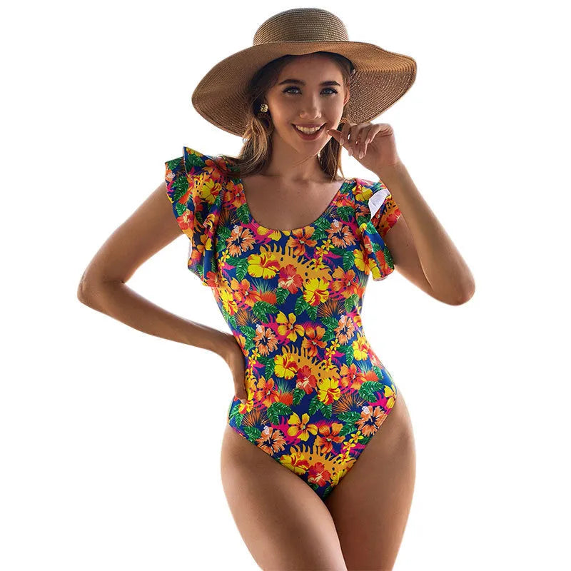 Women's one-piece swimsuit with a U-neck collar featuring lace detail, shown in a solid colour.