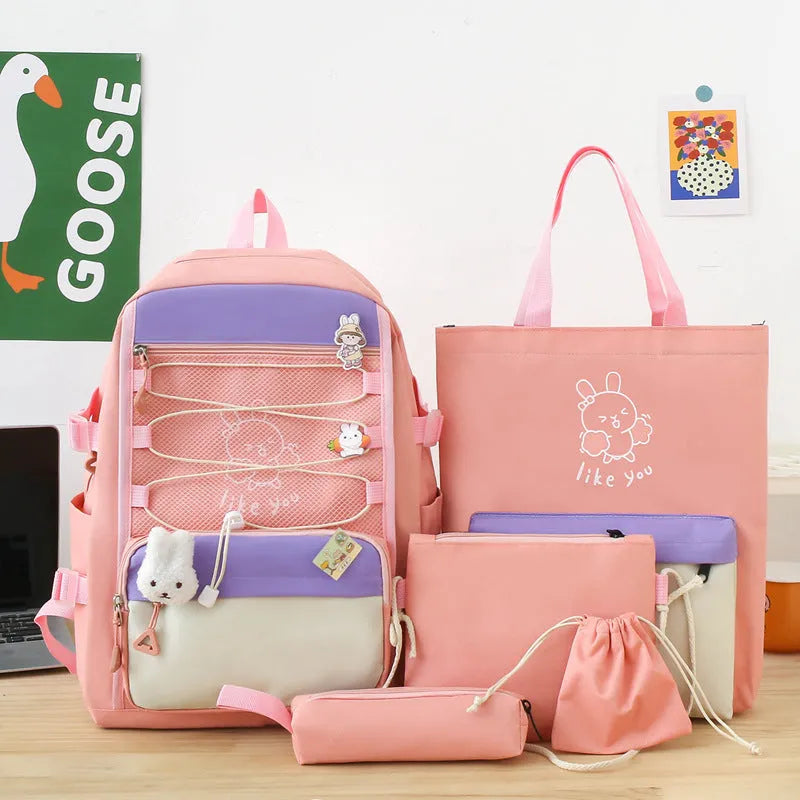 Lightweight nylon student school backpack in a choice of pink, black, purple, or blue solid colours.