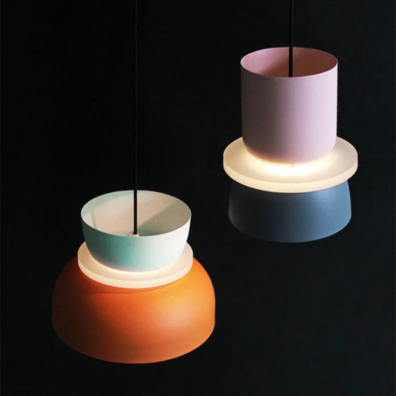 Nordic minimalist iron pendant light with a long fabric cable in a colour-matched finish.