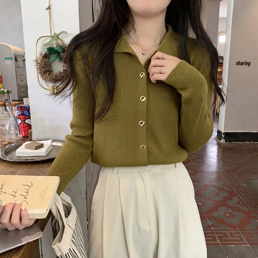 Women's beige knitted cardigan top with long sleeves and loose fit design