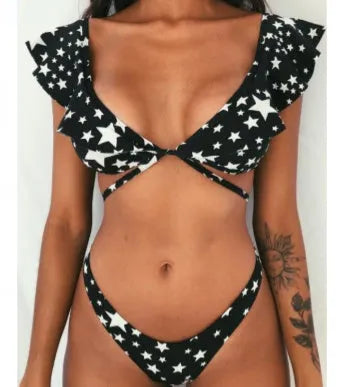 Yellow floral print split bikini swimsuit on a hanger, showing top and briefs.