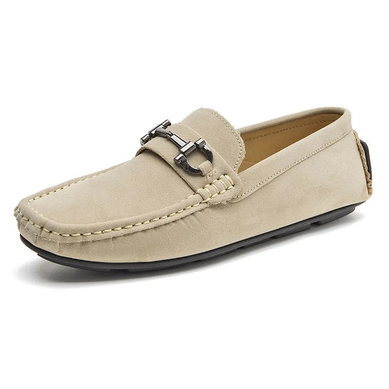 Men's brown casual leather shoes with round toe and rubber sole on a neutral background