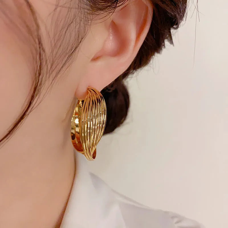 Twisted metal eardrop earring real gold plated round geometric drop earring gold colour stranded multi-layer design