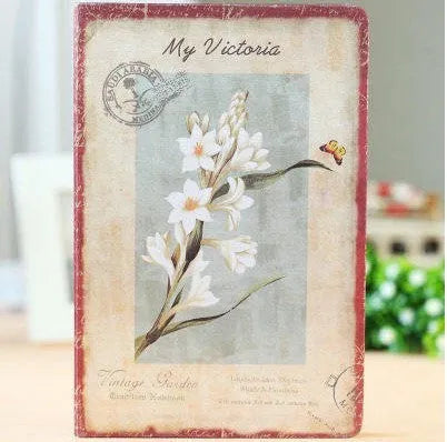Hardcover notebook with retro floral cloth pattern in Lily, Peony, or White Rose designs, showing 25K and 50K sizes.