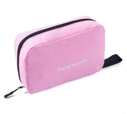 Versatile Travel Organizer: Multifunctional makeup bag with hanging hook, multiple pockets, and foldable design for compact storage