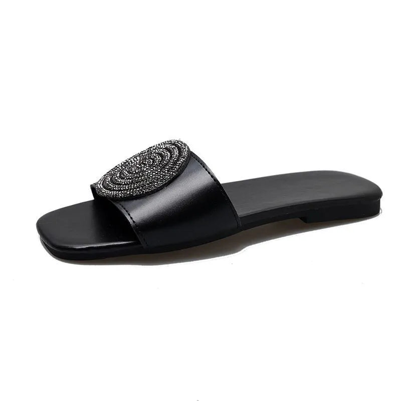Open toe PU slippers with rhinestone trim in black colour