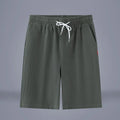 Cotton linen cropped summer pants in Army Green colour with a drawstring waistband.