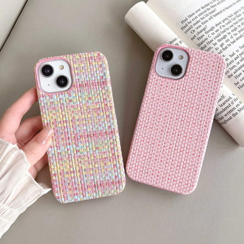 Hand-woven plaid TPU phone case in pink, shown on iPhone, with textured grip pattern and all-inclusive edges.