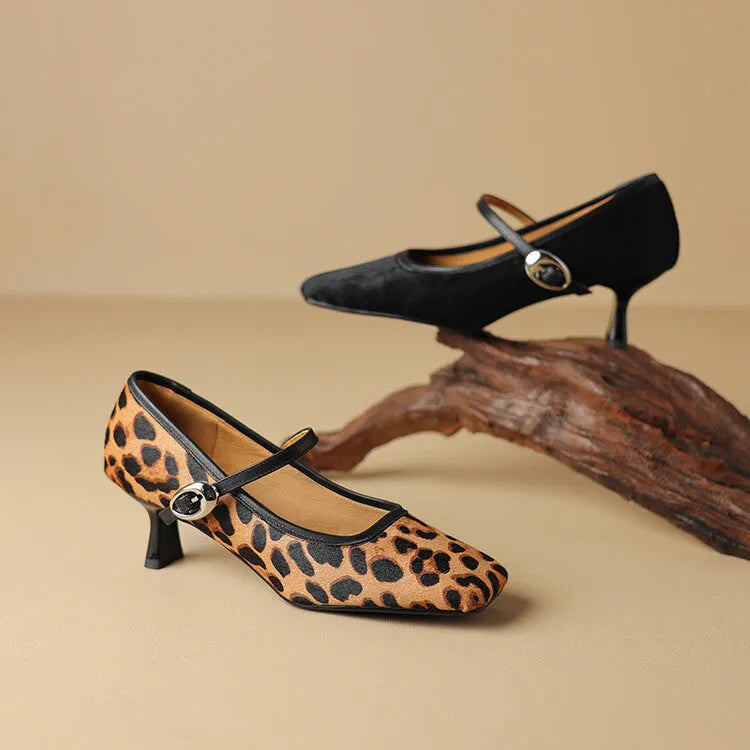 Women's black square toe stiletto heels with horse hair upper and ankle strap.