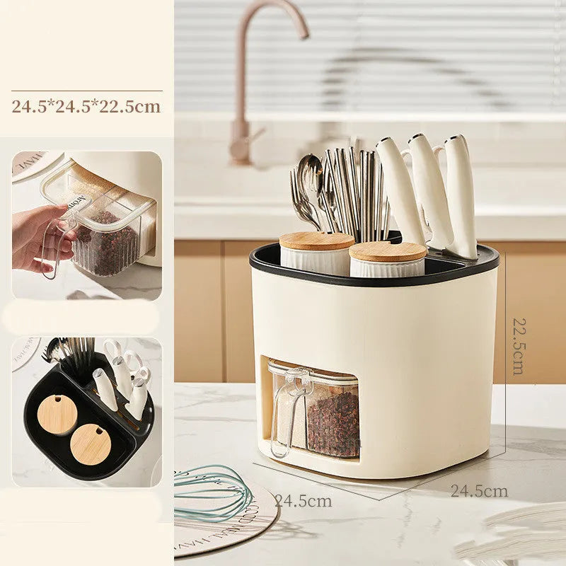 Rotating kitchen storage organiser with four compartments for cutlery and spices