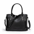 Women's PU leather handbag in black, horizontal square shape, with crossbody strap and sewing line detail