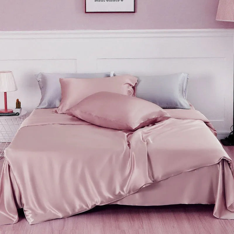 Silk duvet cover in a solid colour, shown in one of six colour options including Lotus Pink and Silver Blue.