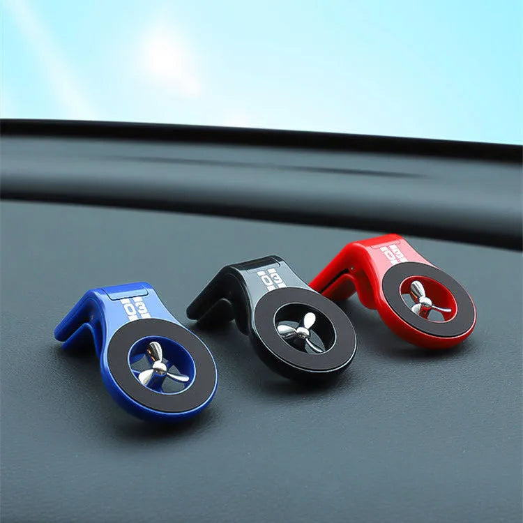 Magnetic car air vent phone holder with rotating paddle and fragrance slots in black, blue or red colour