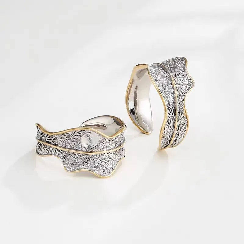 Freshwater pearl ring with irregular leaf design, electroplated metal band, pearl colour, adjustable opening
