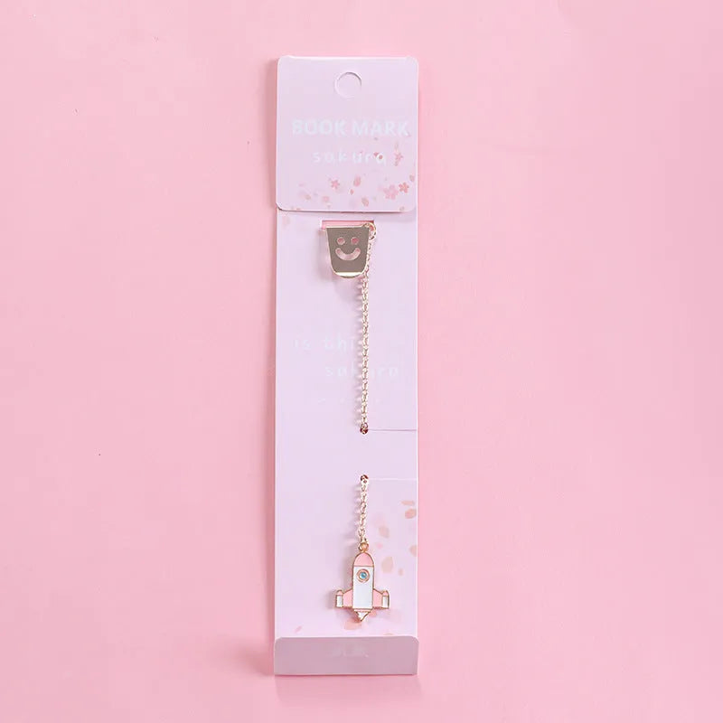 Creative cartoon metal pendant bookmark made from alloy in various designs like panda, rocket, and cat claw.