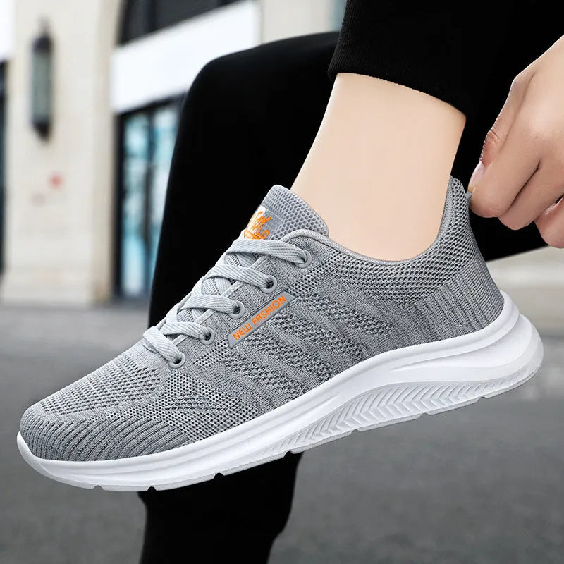 Unisex black mesh trainers in solid colour, sizes 36-44, casual shoes for men and women