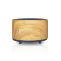 A Bluetooth-controlled flame humidifier and aromatherapy diffuser unit with an LED flame light and 150ml tank.