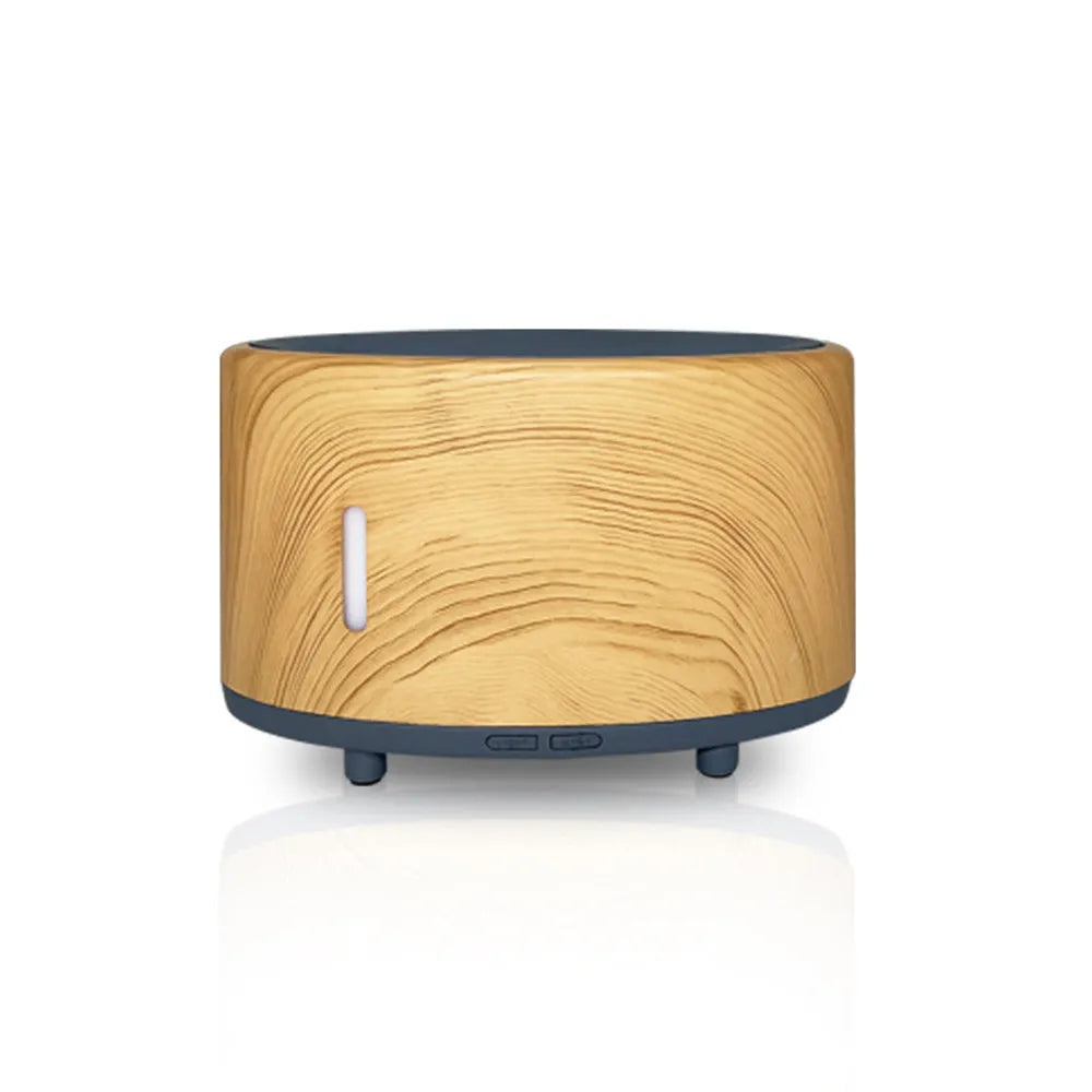A Bluetooth-controlled flame humidifier and aromatherapy diffuser unit with an LED flame light and 150ml tank.