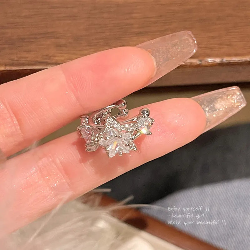 Women's silver electroplated copper star earrings with geometric five-pointed star design